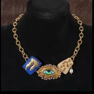 Schiaparelli Inspired Gold Chain Necklace with Blue, Cream & Gold Eye Pendant